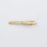 THE GOLDEN STONED TIE CLIP