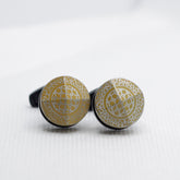 THE CURVED CARAMEL CUFFLINKS